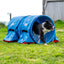 Dog training with a blue Callieway Hoopers agility tunnel outdoors
