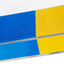 Close-up of yellow and blue anti-slip surface on Callieway agility seesaw